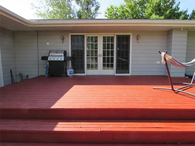 706 49th St S, Great Falls, MT 59405 - wooden deck featuring french doors and grilling area