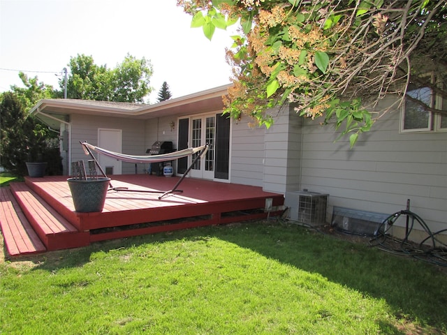 706 49th St S, Great Falls, MT 59405 - wooden terrace with a lawn and central air condition unit