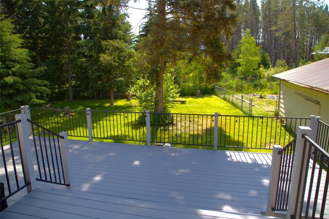 189 Dawn Dr, Columbia Falls, MT 59912 - deck with a yard