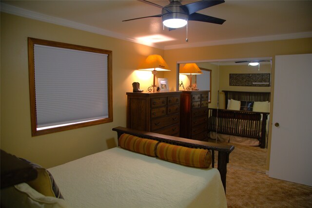 189 Dawn Dr, Columbia Falls, MT 59912 - carpeted bedroom with crown molding and a ceiling fan