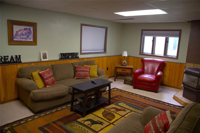 189 Dawn Dr, Columbia Falls, MT 59912 - living area with wainscoting, wood walls, a paneled ceiling, and carpet
