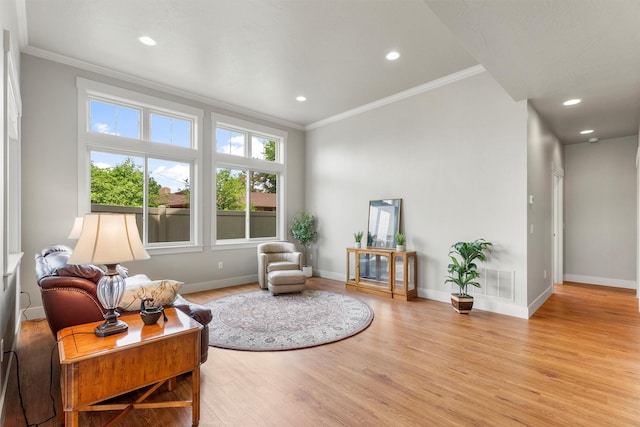 2390 38th St, Missoula, MT 59801 - living area featuring ornamental molding, wood finished floors, baseboards, and recessed lighting