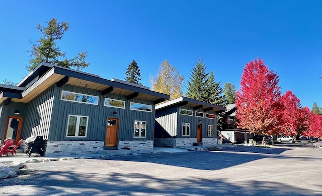 1331 Nelson Ln Cabin H, Unit Cabin H, Whitefish, MT 59937 - contemporary home with board and batten siding