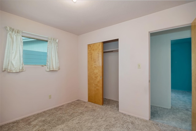 319 W Gail St, East Helena, MT 59635 - unfurnished bedroom with carpet floors, a closet, and baseboards