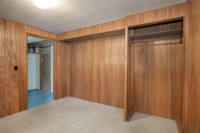 319 W Gail St, East Helena, MT 59635 - unfurnished bedroom with wooden walls and a closet