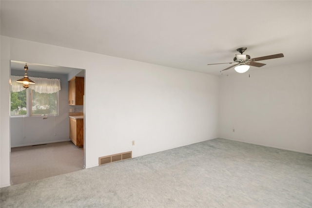 319 W Gail St, East Helena, MT 59635 - unfurnished room with a ceiling fan and light colored carpet