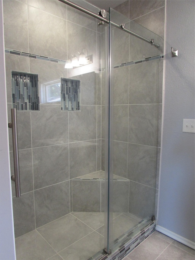 2323 3rd Ave S, Great Falls, MT 59405 - full bath with a shower stall and tile patterned flooring