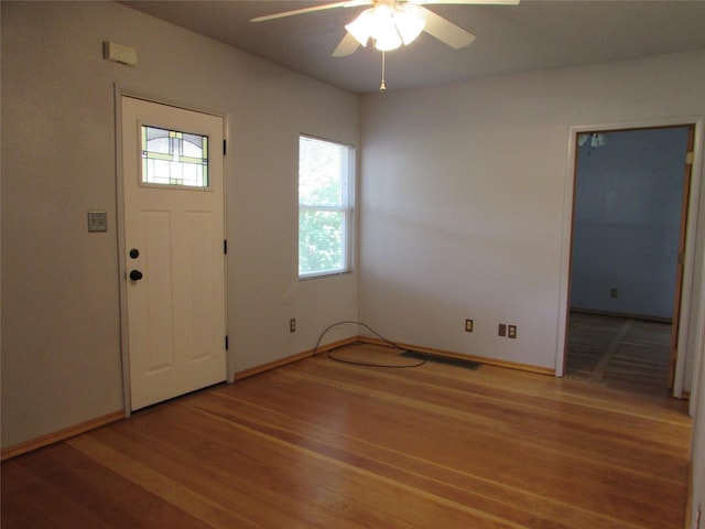2323 3rd Ave S, Great Falls, MT 59405 - entrance foyer featuring ceiling fan, light wood-style flooring, and baseboards