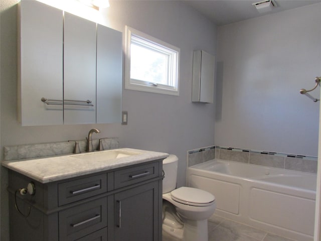 2323 3rd Ave S, Great Falls, MT 59405 - full bath with toilet, vanity, a bath, and tile patterned floors