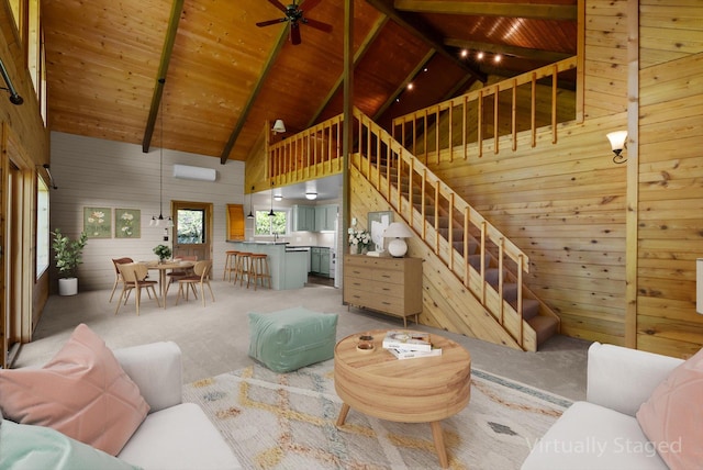 45 Panoramic Dr, Kalispell, MT 59901 - carpeted living area with wooden ceiling with exposed beams, wooden walls, high vaulted ceiling, stairs, and an AC wall unit