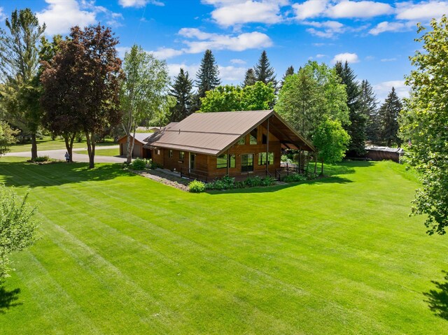 45 Panoramic Dr, Kalispell, MT 59901 - view of green lawn featuring covered porch