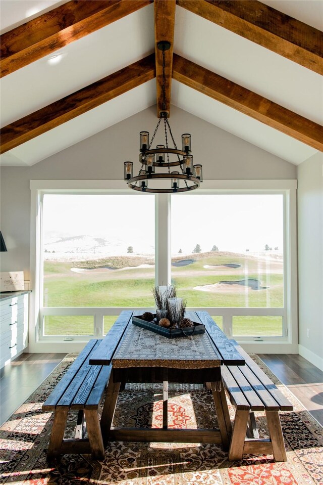 8138 Ranch Club Rd, Missoula, MT 59808 - dining area view of wood finished floors, beamed ceiling, a chandelier, and baseboards