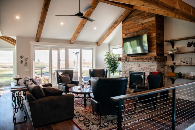 8138 Ranch Club Rd, Missoula, MT 59808 - living room with wood-type flooring, ceiling fan, a stone fireplace, and recessed lighting