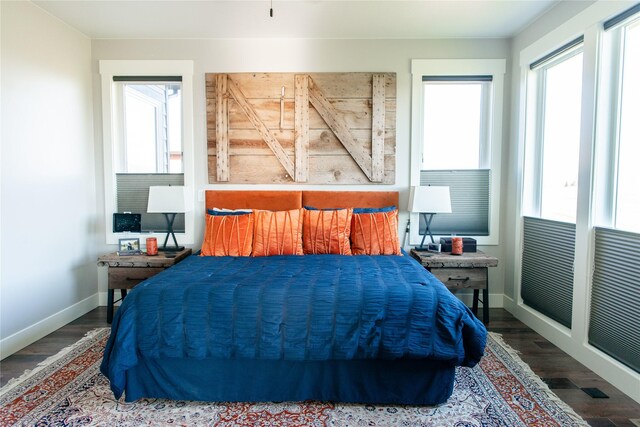 8138 Ranch Club Rd, Missoula, MT 59808 - bedroom with baseboards and wood finished floors