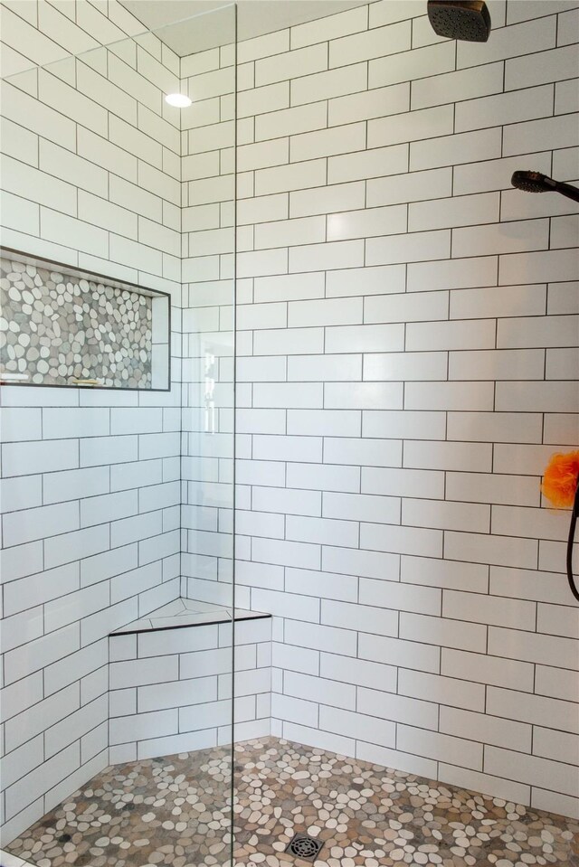 8138 Ranch Club Rd, Missoula, MT 59808 - bathroom featuring tiled shower