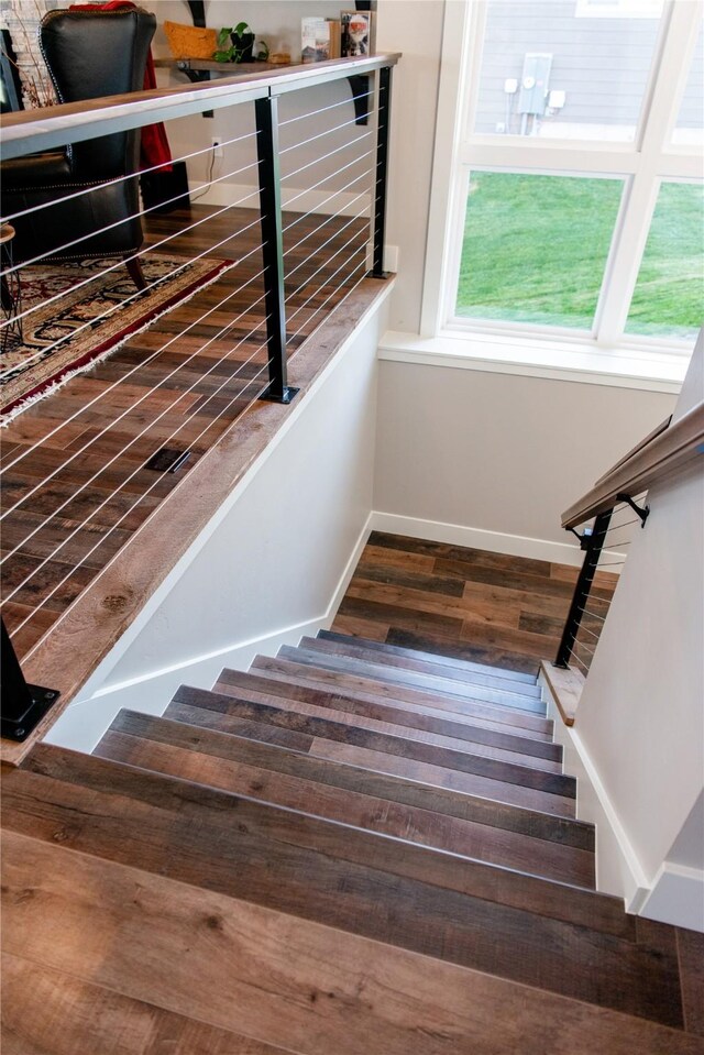 8138 Ranch Club Rd, Missoula, MT 59808 - stairs with wood finished floors and baseboards