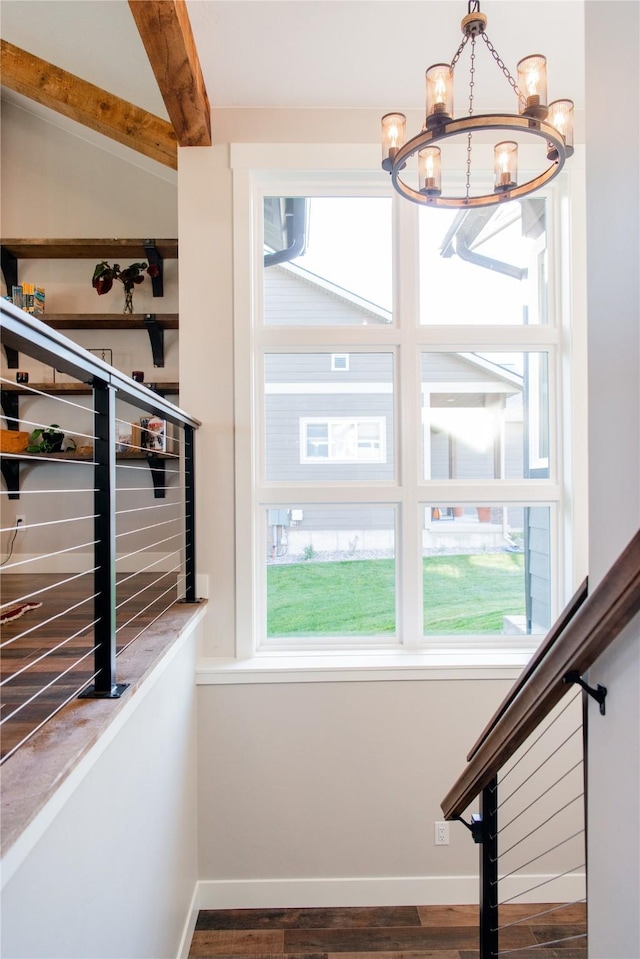 8138 Ranch Club Rd, Missoula, MT 59808 - stairs featuring a chandelier, wood finished floors, baseboards, and beam ceiling