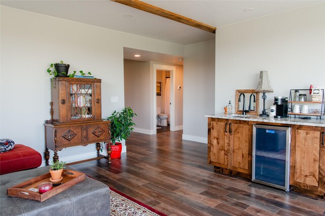 8138 Ranch Club Rd, Missoula, MT 59808 - indoor wet bar featuring wine cooler, dark wood finished floors, and baseboards