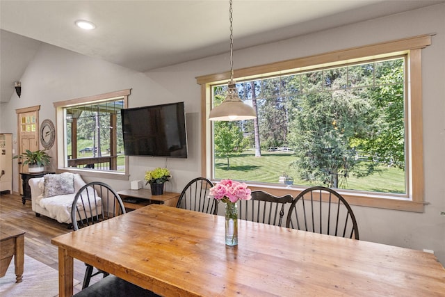 1265 Jellison Rd, Columbia Falls, MT 59912 - dining area with plenty of natural light, wood finished floors, recessed lighting, and vaulted ceiling