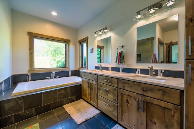 6659 Lamar Trl, Florence, MT 59833 - bathroom featuring double vanity, a garden tub, and tile patterned floors