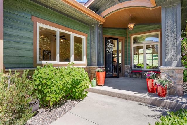 720 Anglers Bend Way, Missoula, MT 59802 - view of exterior entry featuring stone siding and a porch