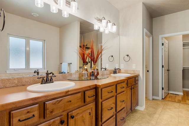 720 Anglers Bend Way, Missoula, MT 59802 - bathroom featuring double vanity and tile patterned flooring