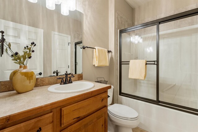 720 Anglers Bend Way, Missoula, MT 59802 - full bathroom with vanity, bath / shower combo with glass door, and toilet