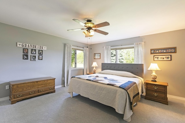 10190 Kona Ranch Rd, Missoula, MT 59808 - carpeted bedroom featuring baseboards and ceiling fan
