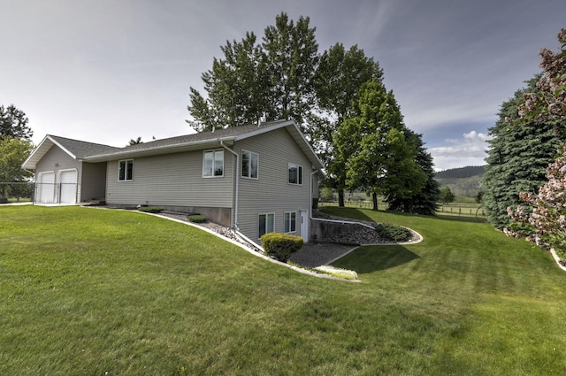 10190 Kona Ranch Rd, Missoula, MT 59808 - view of side of home featuring an attached garage