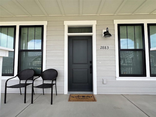 2883 Adam Run Ave, Helena, MT 59601 - doorway to property with a porch