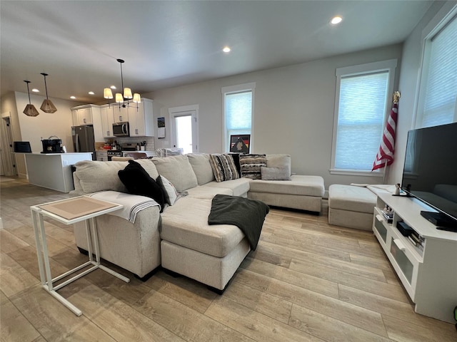 2883 Adam Run Ave, Helena, MT 59601 - living area featuring a chandelier, light wood-type flooring, and recessed lighting