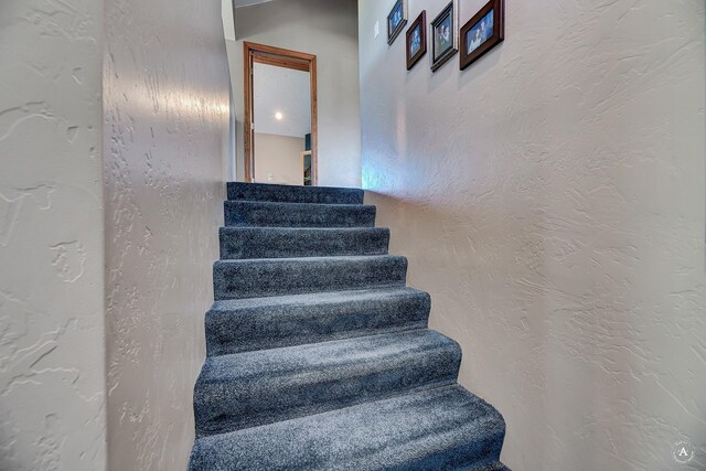 3380 Moulton Reservoir Rd, Butte, MT 59701 - stairway featuring a textured wall