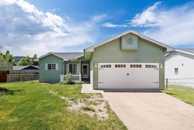 2249 Canvasback Ct, Kalispell, MT 59901 - single story home with an attached garage, driveway, and a porch