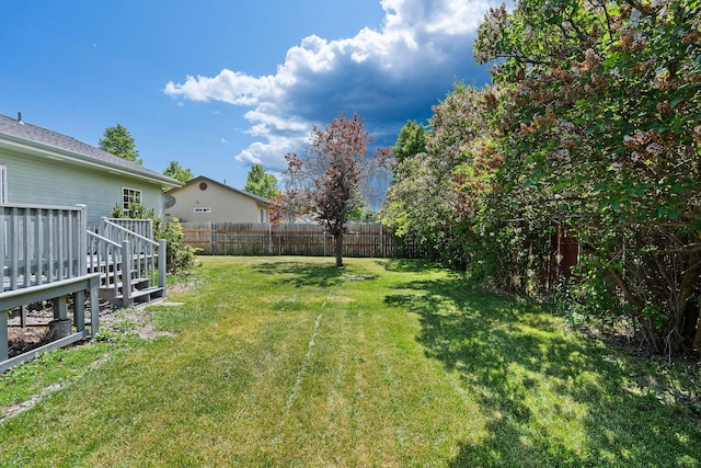 2249 Canvasback Ct, Kalispell, MT 59901 - view of yard featuring a wooden deck
