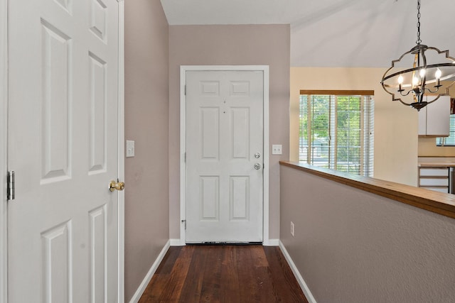 2249 Canvasback Ct, Kalispell, MT 59901 - entryway featuring dark wood-type flooring, baseboards, and a chandelier