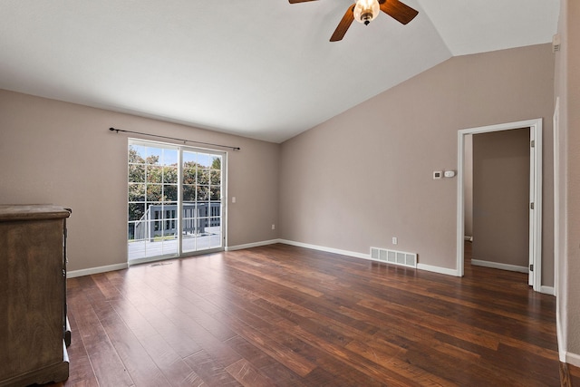 2249 Canvasback Ct, Kalispell, MT 59901 - spare room featuring vaulted ceiling, ceiling fan, dark wood-style floors, and baseboards