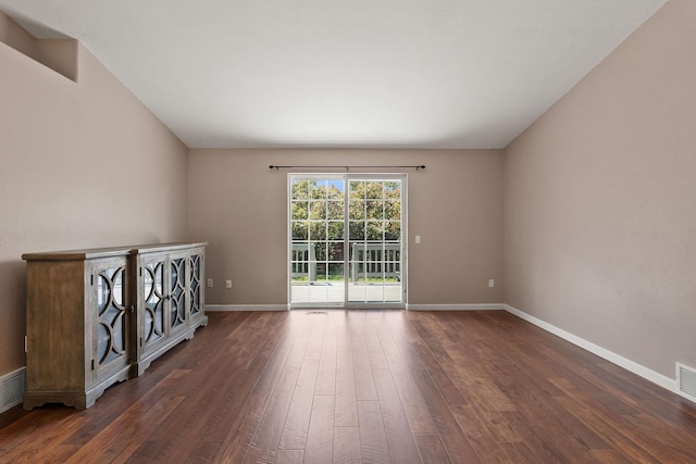2249 Canvasback Ct, Kalispell, MT 59901 - empty room featuring dark wood-style floors and baseboards