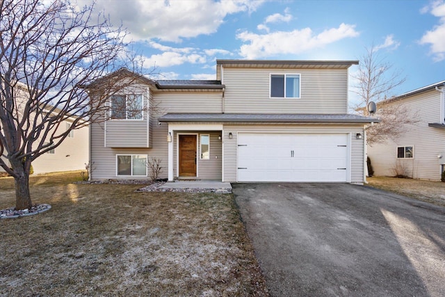 119 Barron Way, Kalispell, MT 59901 - view of front of property featuring an attached garage, asphalt driveway, and a front yard