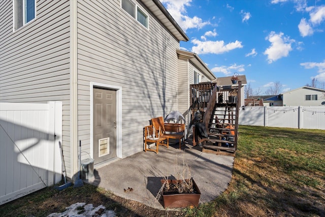 119 Barron Way, Kalispell, MT 59901 - view of side of property featuring stairs, a deck, and a patio