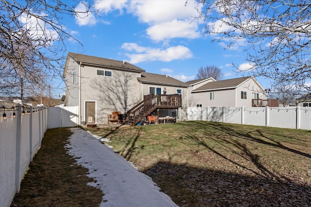 119 Barron Way, Kalispell, MT 59901 - back of house featuring stairs, a wooden deck, a fenced backyard, and a gate