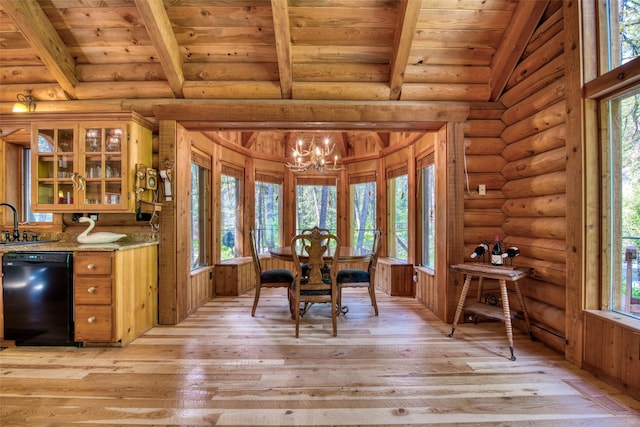 1062 Bear Creek Trl, Victor, MT 59875 - dining room featuring a wooden ceiling with exposed beams, a chandelier, and light wood-style floors