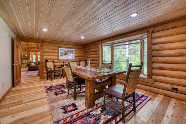 1062 Bear Creek Trl, Victor, MT 59875 - dining room featuring wood ceiling, light wood finished floors, recessed lighting, and rustic walls