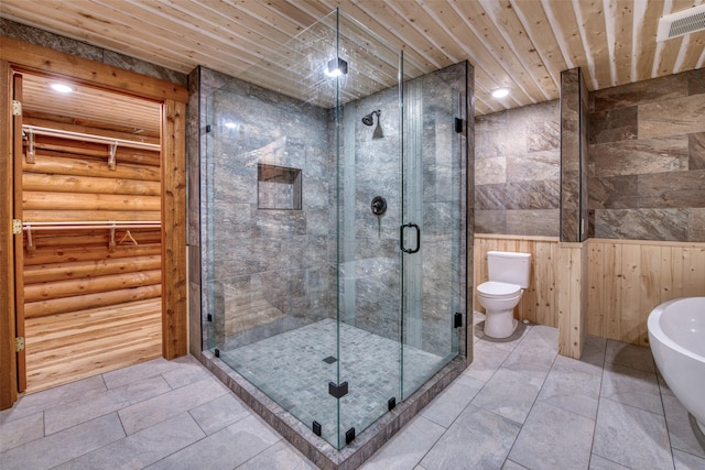 1062 Bear Creek Trl, Victor, MT 59875 - bathroom featuring a stall shower, wooden ceiling, and a freestanding tub