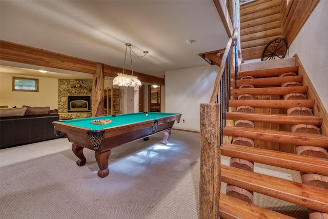 1062 Bear Creek Trl, Victor, MT 59875 - playroom with pool table, a stone fireplace, and carpet floors
