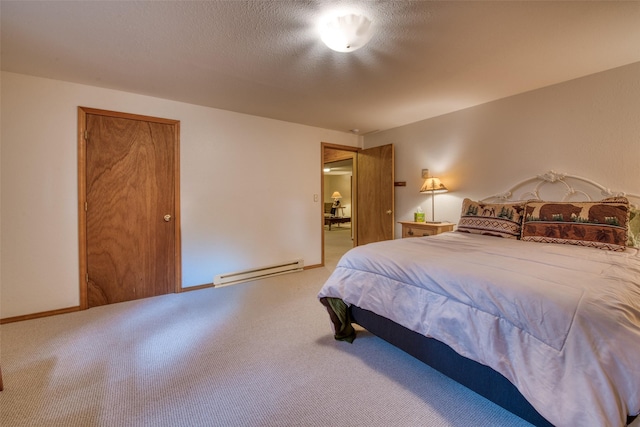 1062 Bear Creek Trl, Victor, MT 59875 - bedroom featuring a baseboard radiator and carpet flooring
