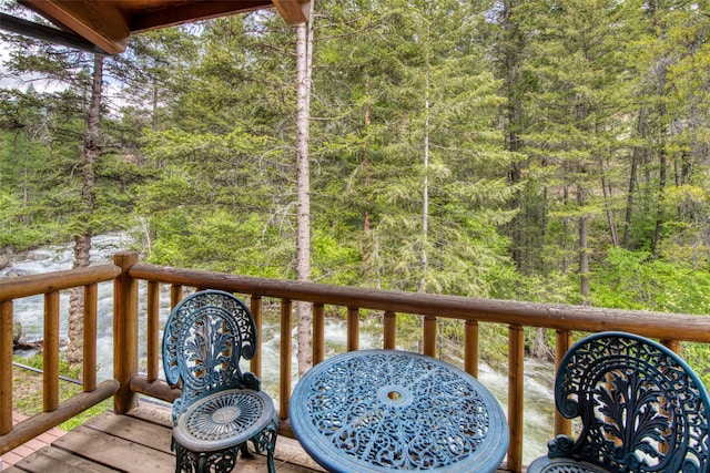 1062 Bear Creek Trl, Victor, MT 59875 - wooden deck featuring a view of trees