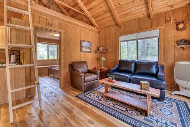 1062 Bear Creek Trl, Victor, MT 59875 - living room featuring wood ceiling, wood walls, and wood finished floors