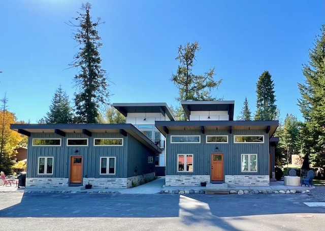 1331 Nelson Lane Cabins H & I, Whitefish, MT 59937 - modern home featuring board and batten siding