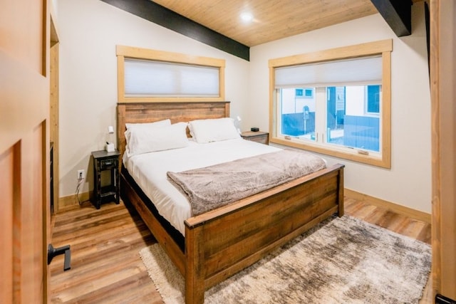 1331 Nelson Lane Cabins H & I, Whitefish, MT 59937 - bedroom featuring wooden ceiling, light wood-style floors, baseboards, and recessed lighting