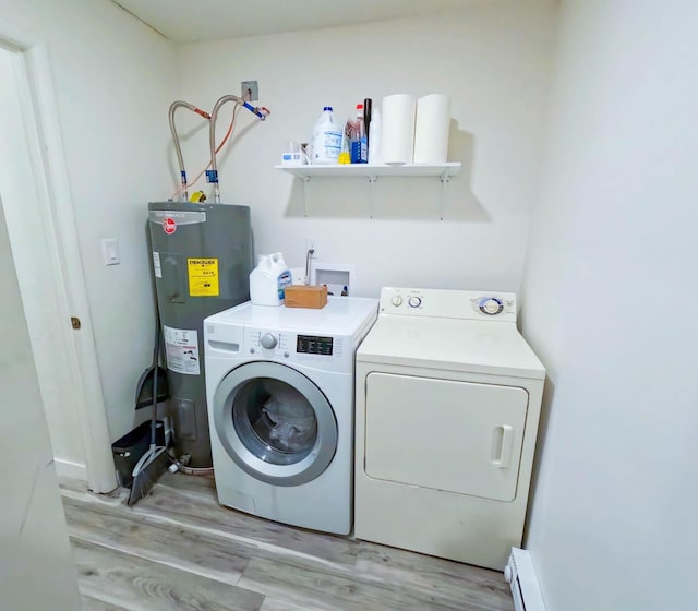 1203 1st St E, Polson, MT 59860 - laundry area with water heater, independent washer and dryer, and light wood-style floors